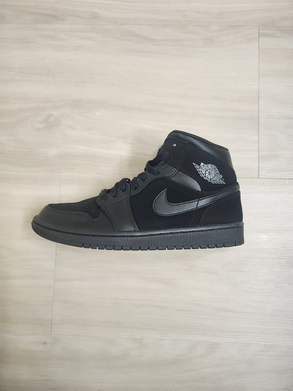 Jordan All-Black High Top Sneakers